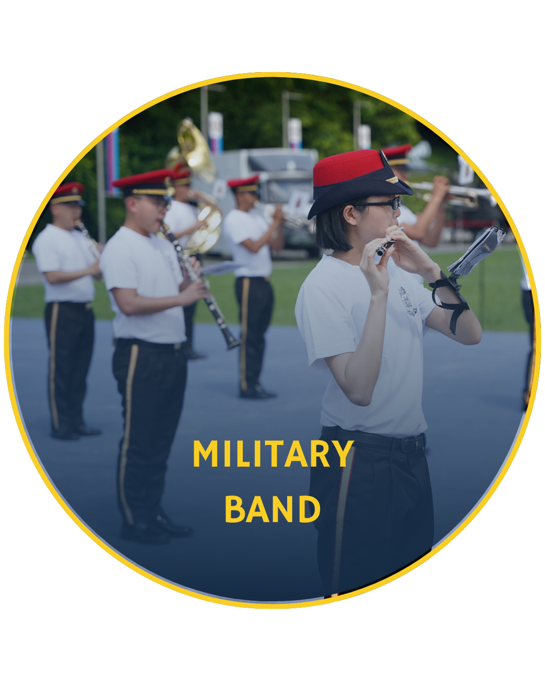 Military band members performing during a parade with a conductor.
